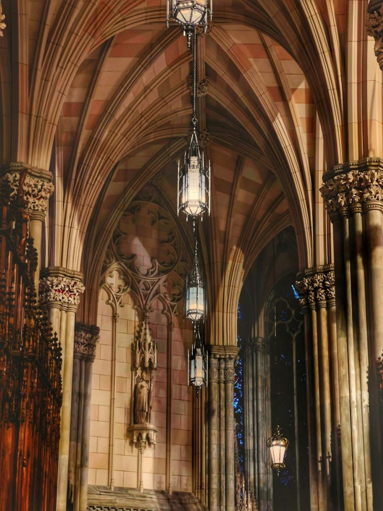 The aisle of a cathedral. 