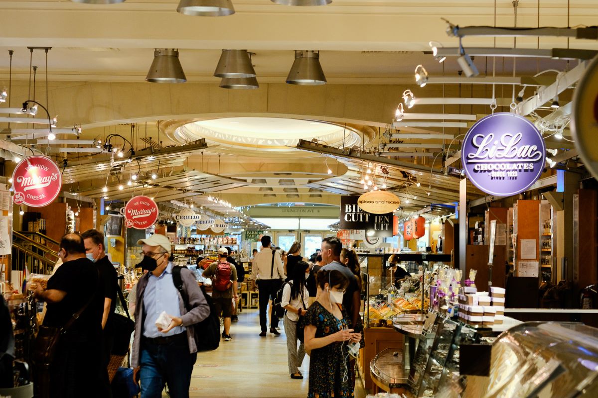 people walking about in a market