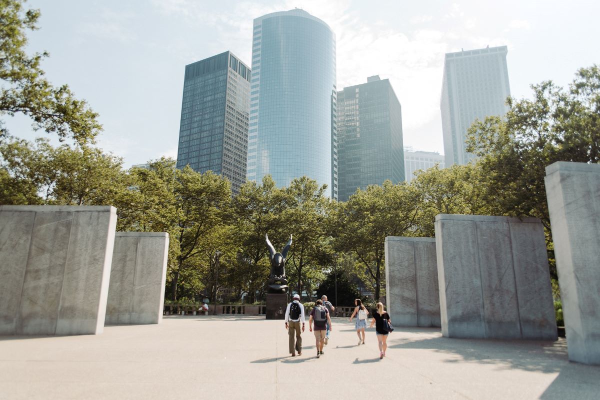 people walking with a tour guide