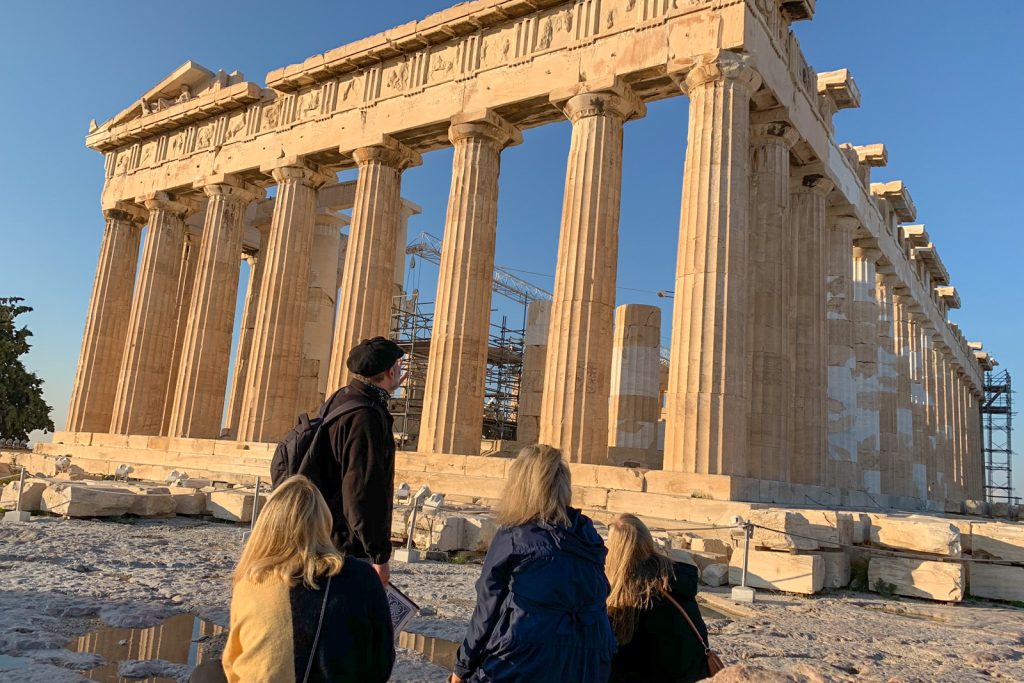 Guide explaining ancient sites in Athens, Greece