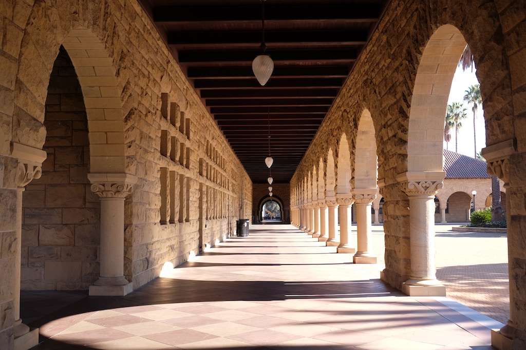 The architecture style of Standford University's Main Quad is Richardsonian Romanesque - a blend of Romanesque and Mission Revival architecture.