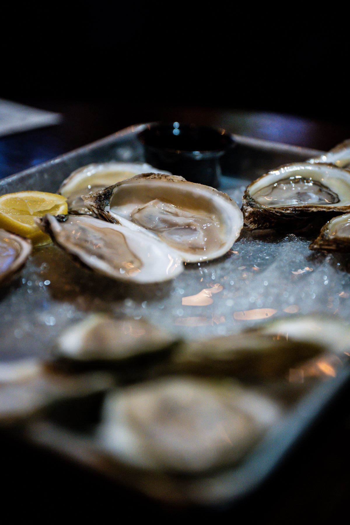 Oysters sitting on a bed of ice