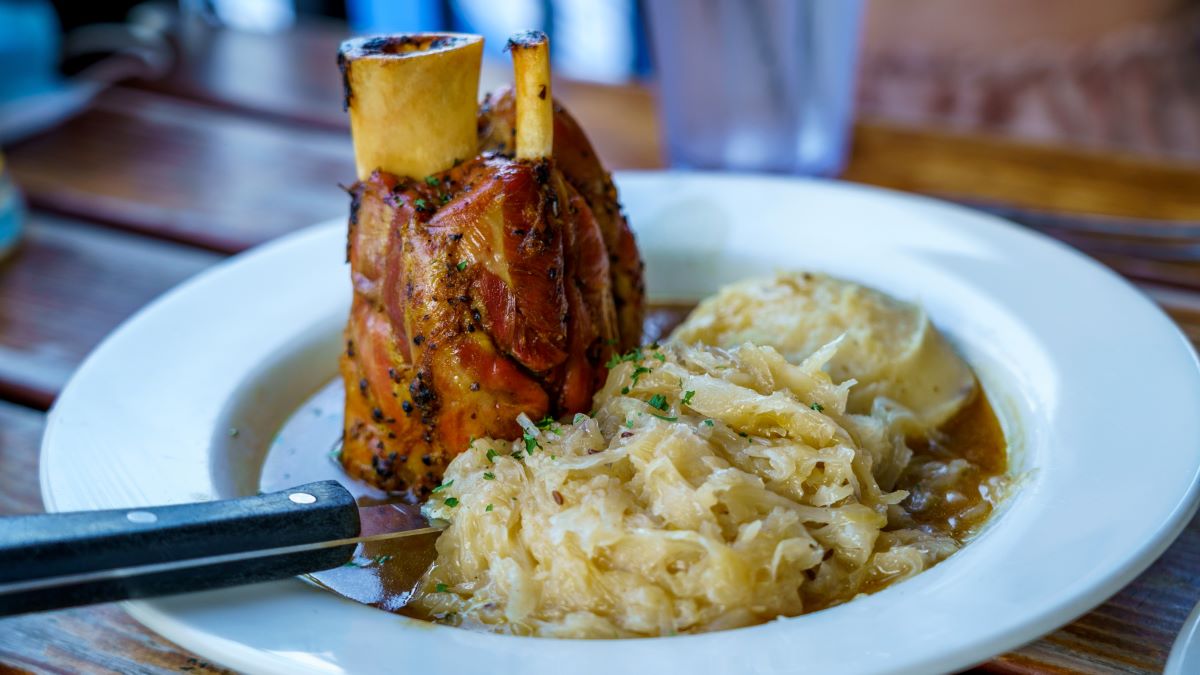 pork and potatoes on a plate