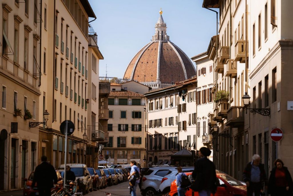 people walking through the city of Florence