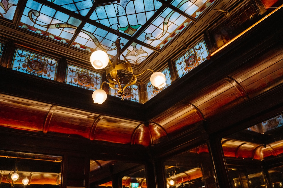 Glass dome with stained glass inside an Irish pub in Dublin. 