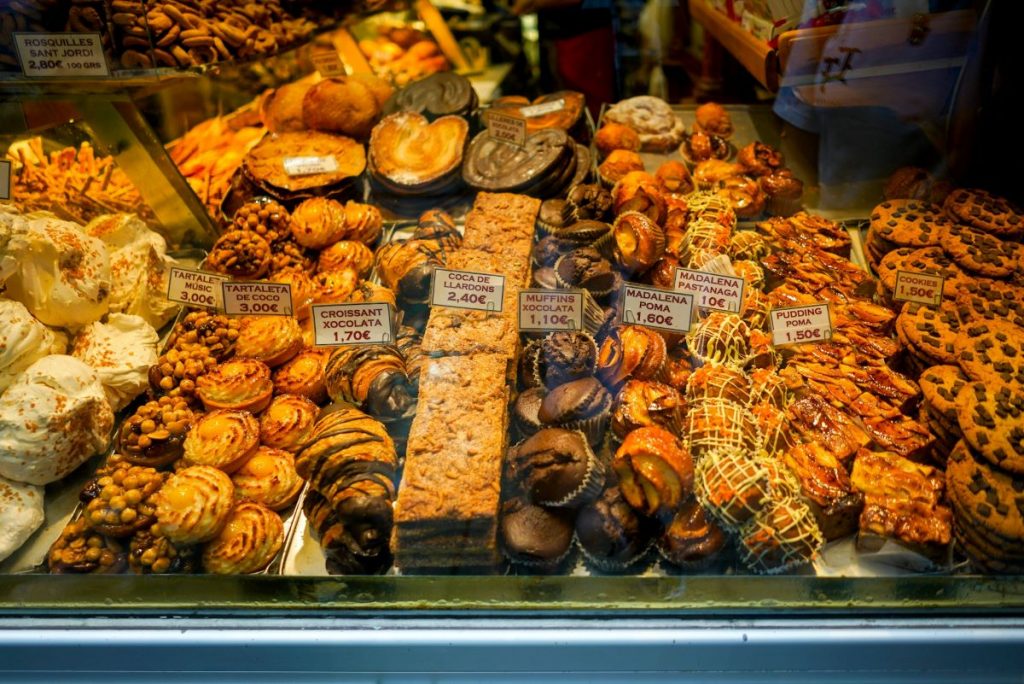 An array of pastries in Barcelona at a pastry shop.