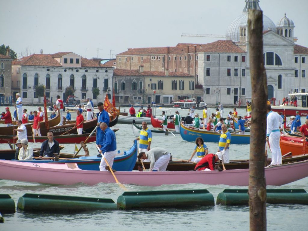 people on gondolas in venice