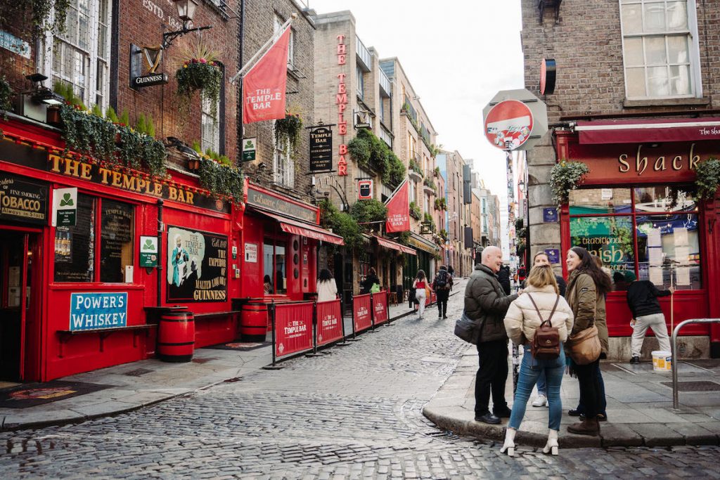 Group chatting outside of Temple Bar