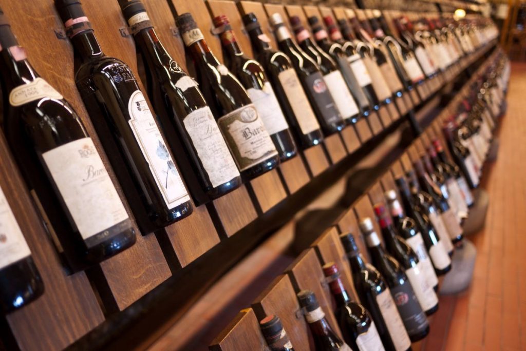 wooden racks of wine bottles