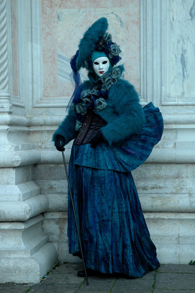 woman dressed in ornate costume for venice carnaval