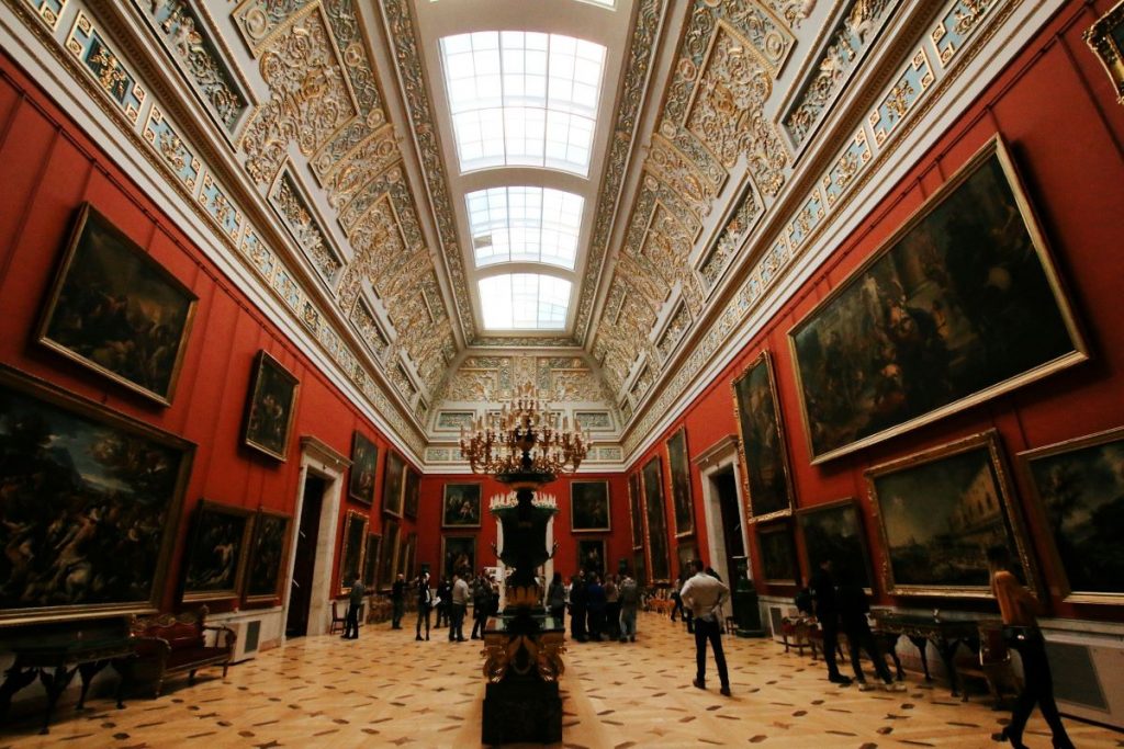 People walking around the different galleries at Hermitage Museum in Saint Petersburg, Russia