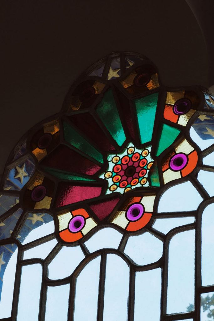 A stained glass window at the Bellesguard, one of the unusual things to do in Barcelona, Spain. 