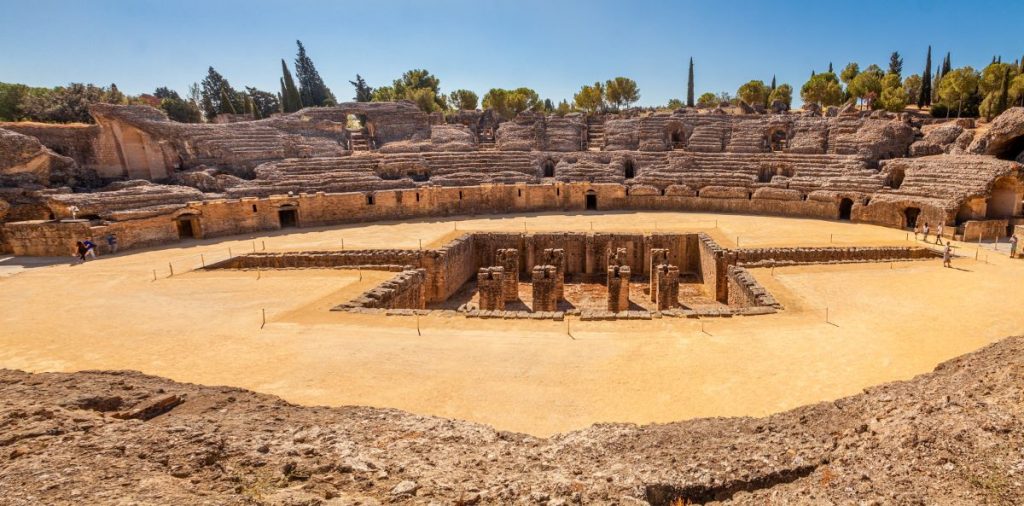 People visiting Italica in Seville. 