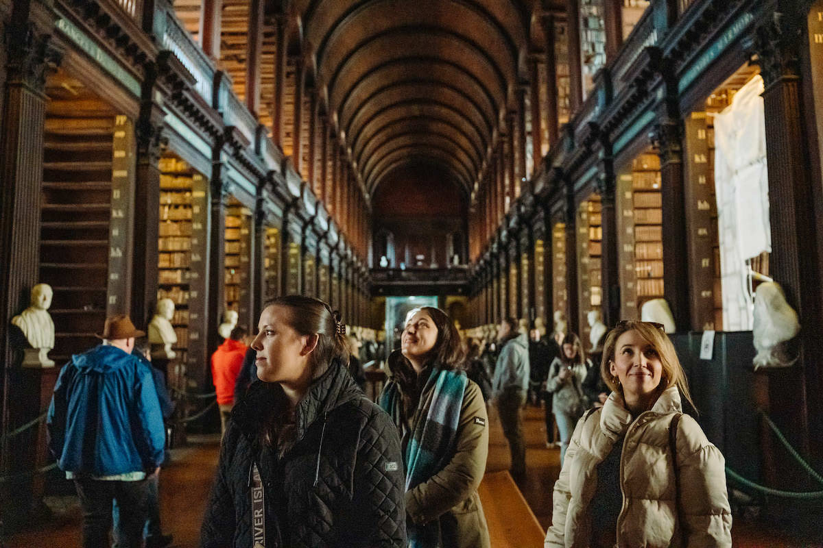 People smiling and looking at the Library in Dublin