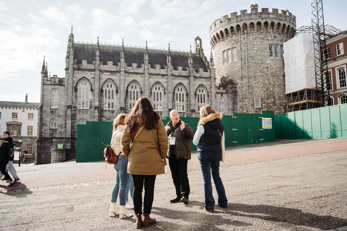 Walks tour at Dublin Castle explaining architecture.