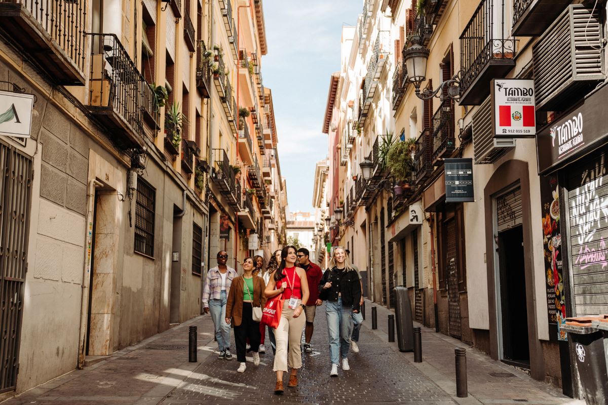 group of people walking down street