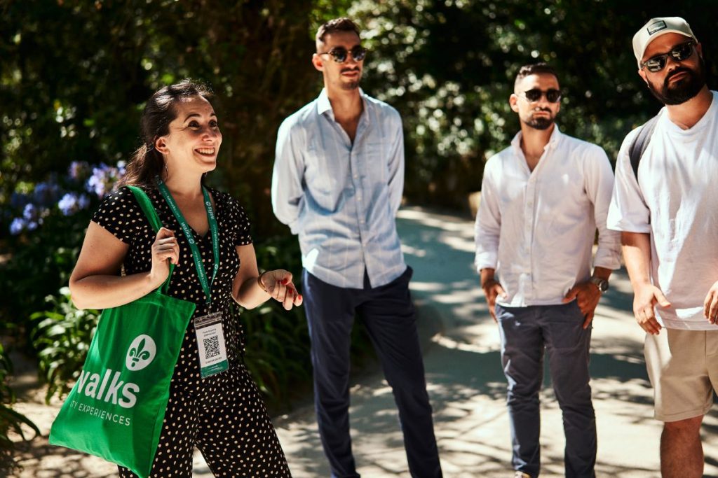 A tour guide talking to a group of people.