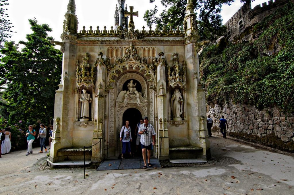 People walking out of a chapel in Sintra. 